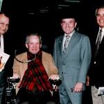 Alex (far right) with Willy Shoemaker (seated) and other jockeys