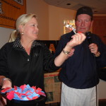 Kitty and Jim Fassel raffling off prizes